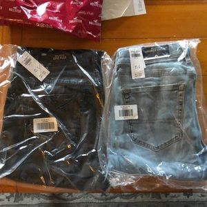 Two pair of Hollister slim straight jeans.